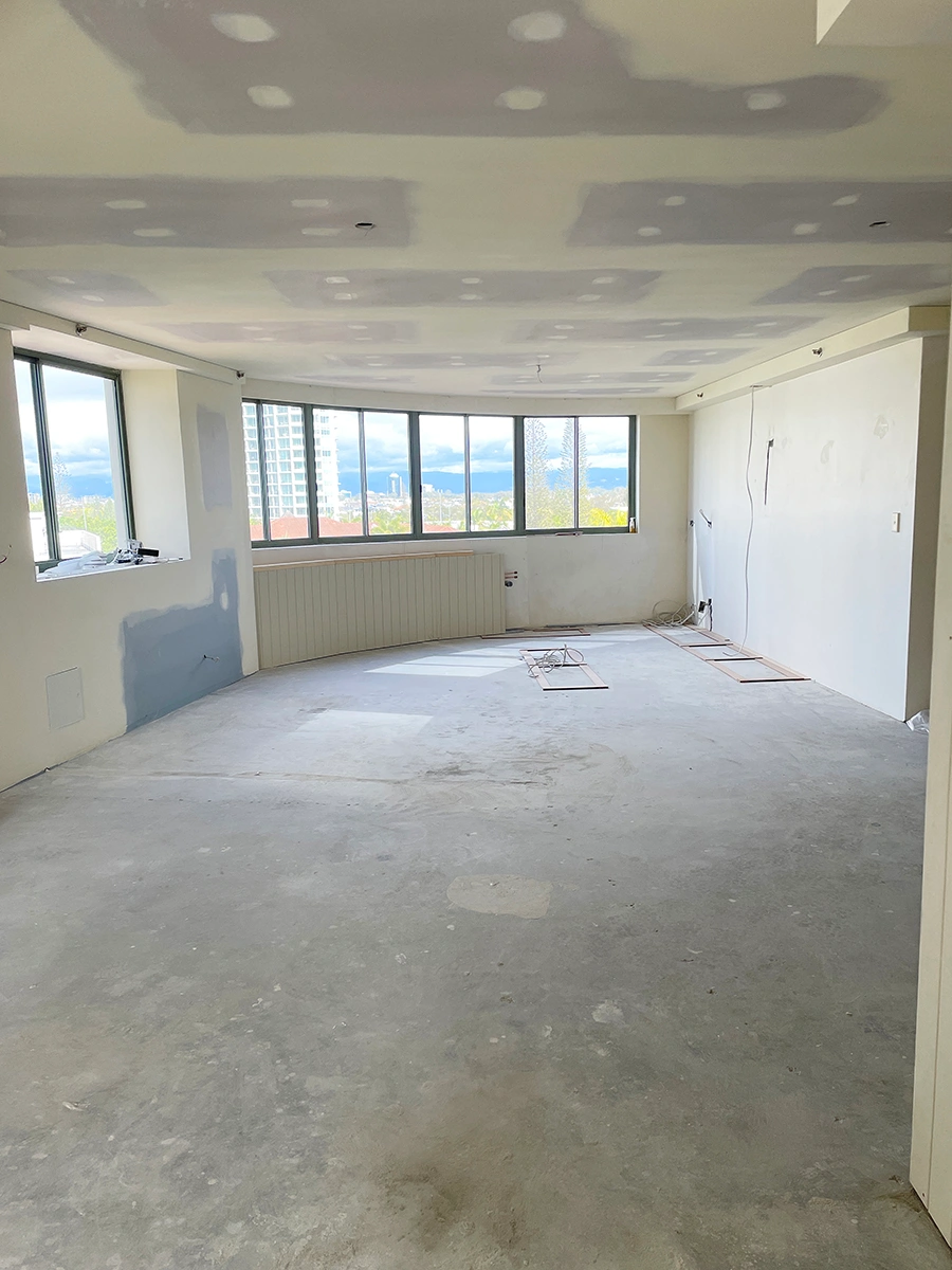 Apartment renovation in progress showing demolition and construction phase