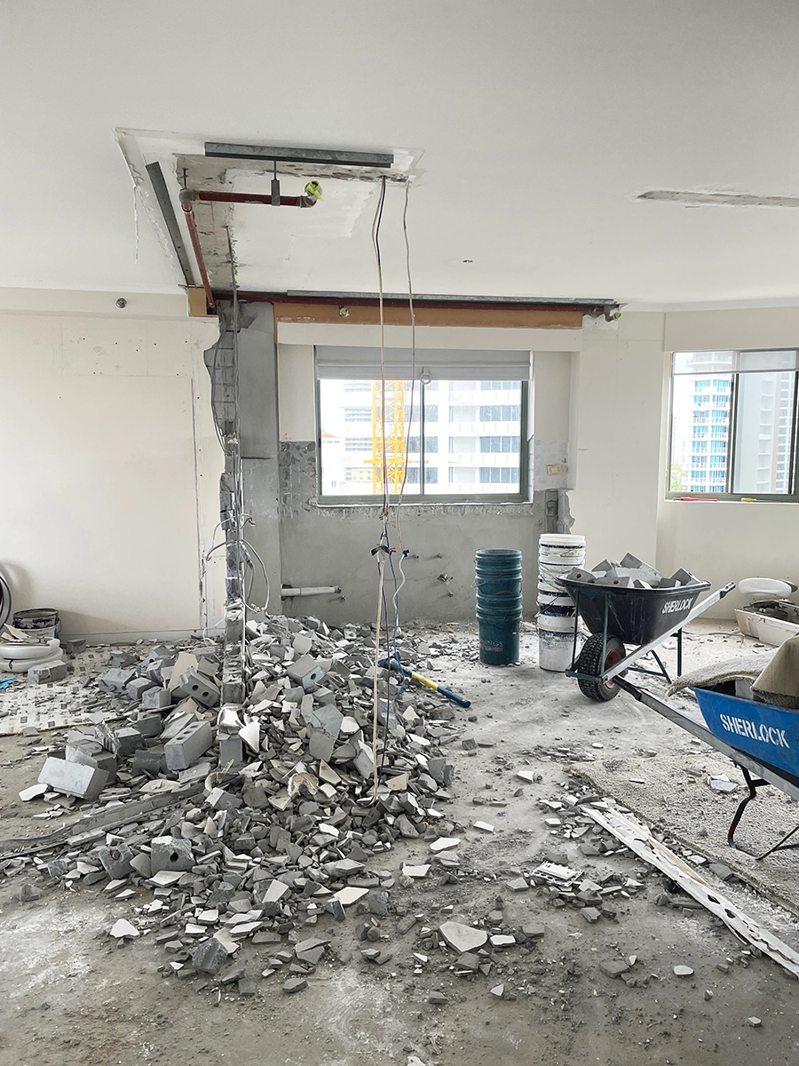 Apartment renovation mid-stage showing structural updates and new layout taking shape